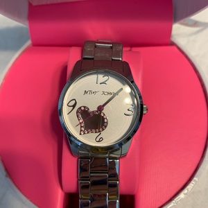 Silver tone butterfly band with pink heart detail